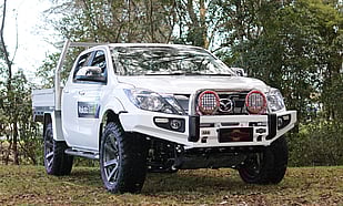 2019 Mazda BT50 Featuring an ARB Sahara Bar (colour coded to the vehicle), ARB V2 Intensity Lights, 9.5000 LB KingOne Raptor Winch and Terrain Gripper Mud Tyres