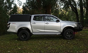 Featuring an ARB Summit Bull Bar, Revo Winch, Night Hawk 28" Lightbar, ARB Recovery Points, OME Suspension Upgrade, 310 CON 6 Method Wheels & Mickey Thompson ATZ P3 Tyres