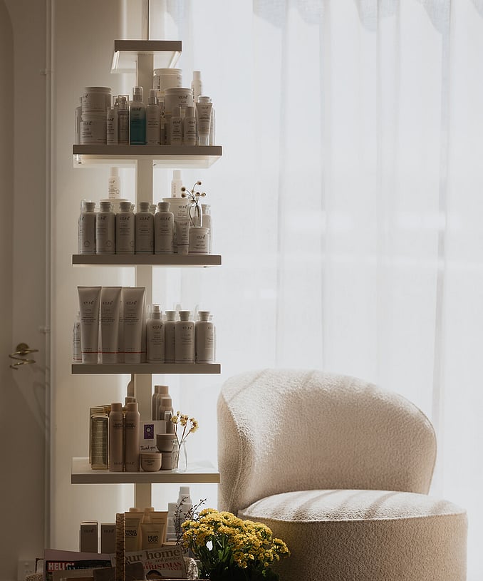 The Keune hair salon retail range on it's shelves by the waiting area.