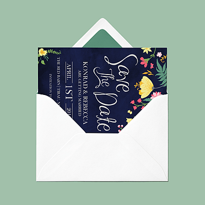 Wedding invitation in an envelop featuring floral design
