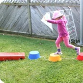 Sprouts child learning to balance