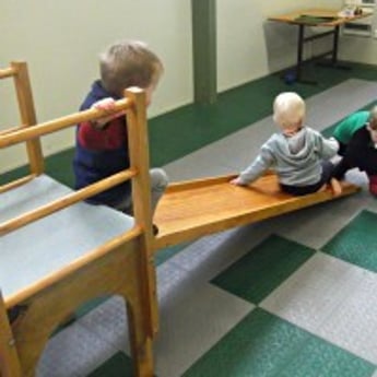 Sprouts toddlers on slide