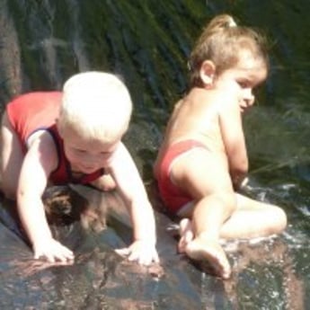 Toddlers on water slide Waipukurau
