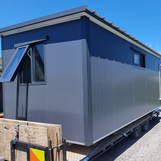 4.6m x 2.7m Grey with laminate floor