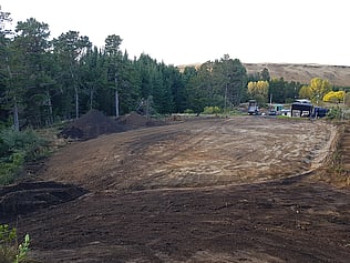 landscaping and earth pile clearing, site drainage