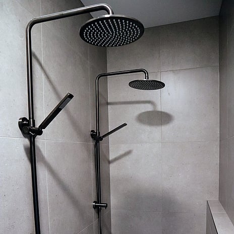 Image of modern tiled walk in shower. Tiling service by Cosmic Tiling. Waikato.