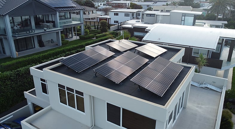 Solar panels installed with tilts on roof of beachside home in Mount Maunganui
