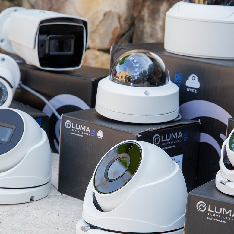 Security cameras with their packaging.