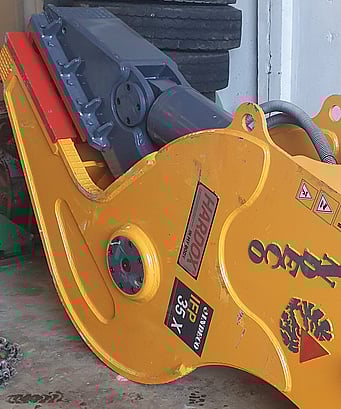 a brand new Italian designed and manufactured Indeco brand hydraulic IFP 35x fixed pulverizer on floor of  warehouse