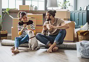 First home buyers with dog moving into new house