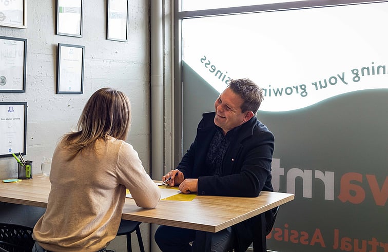 Insurance Adviser and Business Owner sitting down to chat about Business Insurances