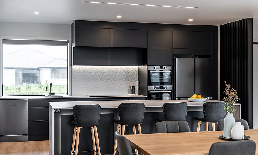 Bespoke black kitchen was designed by Linecrest Homes and features floor-to-ceiling sleek black cupboards was a Gold winner. 