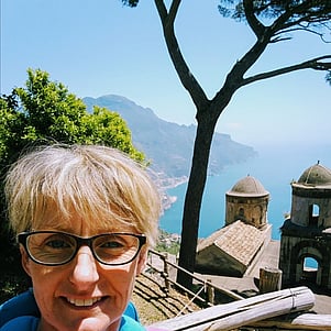 Woman in gardens above Amalfi Coast