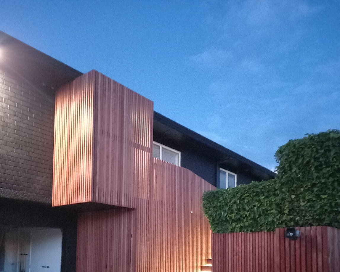 Contemporary Mount Maunganui renovation showcasing cedar cladding and cedar stairs
