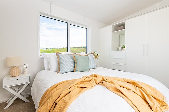 bedroom in tiny home cabin
