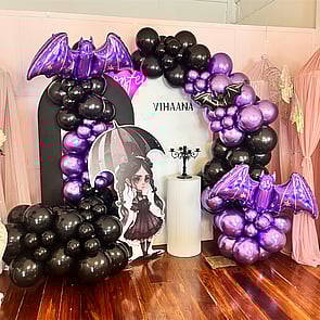 WEDNESDAY ADDAMS  - From the super popular tv show WEDNESDAY we loved creating this purple and black &lsquo;moody&rsquo; Wednesday theme.