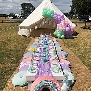 PASTEL RAINBOW - A colourful option for those colourful characters. This set up was done with our bell tent as a feature backdrop.
