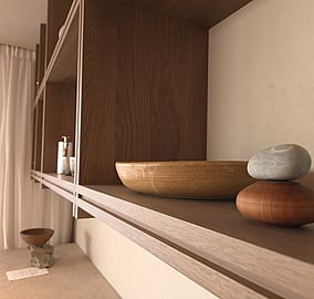 Bespoke timber kitchen shelving and joinery detail in an architectural coastal beach home on Ocean Beach Road, Mount Maunganui, built by Tauranga architectural builders MB Construction.