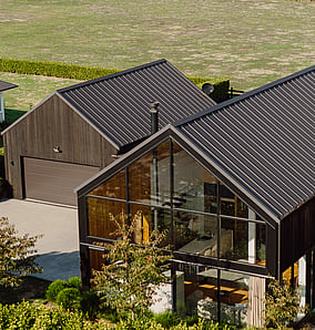 Architectural rural home near Matamata with cedar cladding and gabled roofline, built by MB Construction, residential builders for Matamata and the Bay of Plenty.