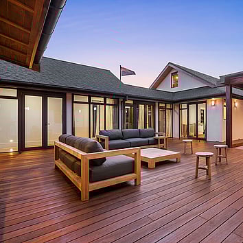 Timber text with outdoor furniture. 