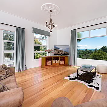 Traditional New Zealand lounge with timber flooring.