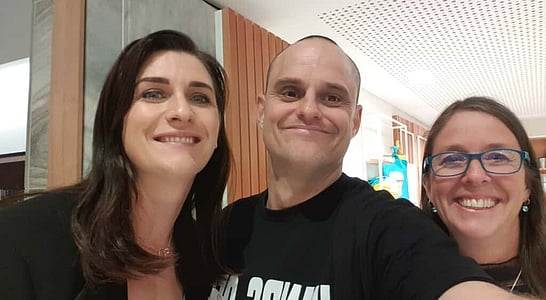 Moments of laughter and shared strength &mdash; community advocates standing together for survivors.