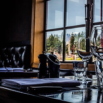 A view of a table set at Pier 19 restaurant, one of the Queenstown restaurants founded by Grant Hattaway.