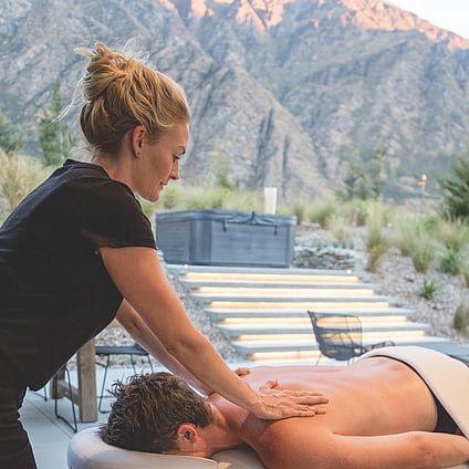 A Client receiving a massage in their home in Queenstown.