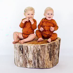 Studio photography for Kauri and Sons childens fashion with wooden stump