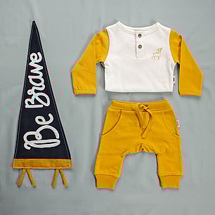 Childrens fashion photography for Kauri and Sons Studio flatlay baby clothing