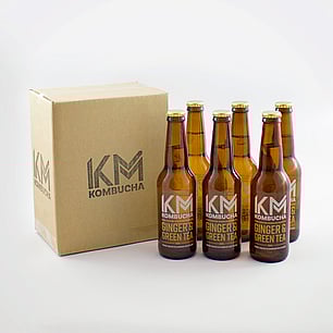Studio photography of bottle for kombucha brand