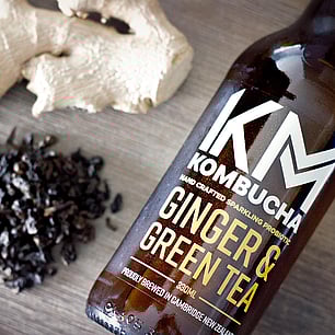 Studio photography of bottle for kombucha brand