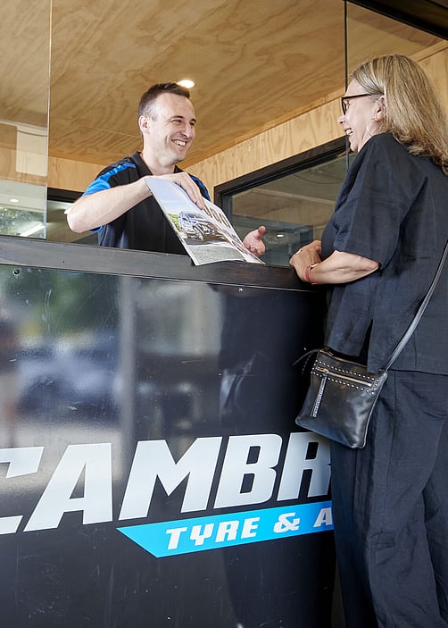 Cambridge Tyre and Alignment - Meeting customer at reception desk