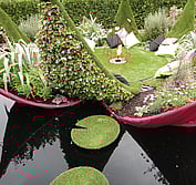 Ben Hoyle Design - "She Love's Me, She Love's Me Not". In the wake of the February 2011 earthquakes this landscape explored escaping terra firma by floating away on this water lily inspired outdoor room.