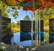 Ben Hoyle Design - ''Under My Umbrella" Inspired by Ben's own experience in Hagley Park, Christchurch during the 2011 earthquake. This multi-tiered water sculpture comprises 185 leaves, one for every victim of this tragedy.