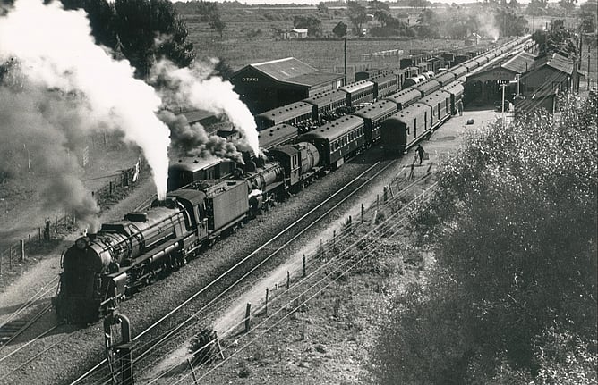 Full house &ndash; three trains crossing at Otaki. Taken from the top of the water vat in the Otaki yard. January 5, 1935