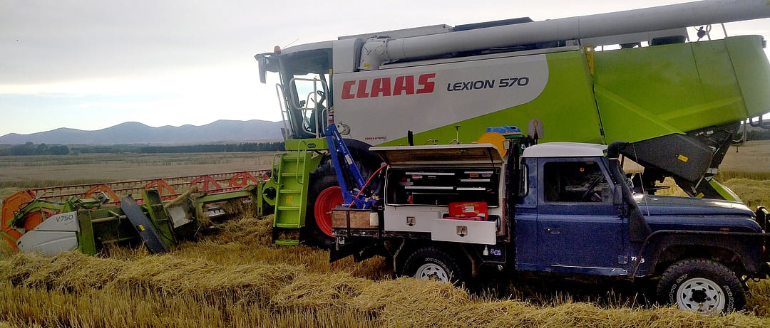 Onsite combine harvester repairs in the Maniototo. AEM brings servicing to you.