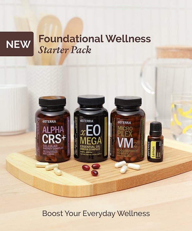 doTerra Foundational Wellness starter Pack Alpha CRS supplement, xEO Mega supplement, Micro Plex VM supplement and lemon essential oil all on a kitchen board with 3 pills of each in front of the bottles