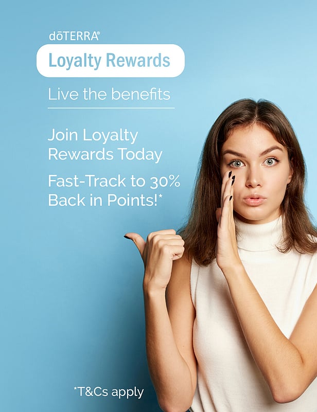 a woman whispering about the benefits of joining the doTERRA loyalty rewards program