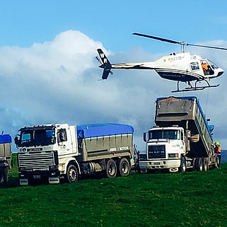 helicopter and trucks