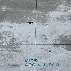 Printed marks on a concrete slab by PLS.