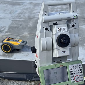 The PLS robotic total station and site print robot together.