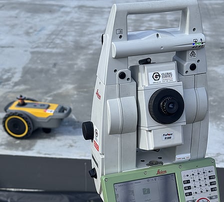 The robotic total station overlooking the PLS site print robot.