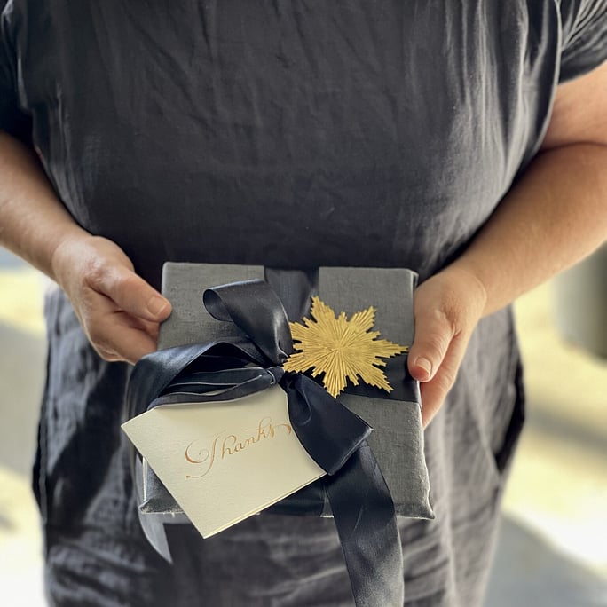 At my neighbours front door thanking them for their support