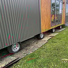 Tiny Towing Solutions use ground mats are used to help homes sinking in wet