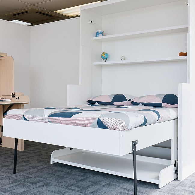 Space-saving Hidden Bed solutions that seamlessly transition from a desk to a bed, perfect for small spaces.