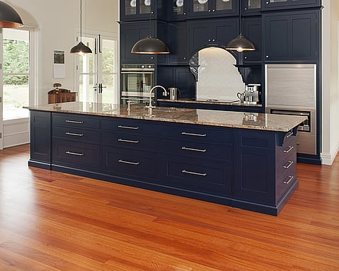 Timber accents in the kitchen, adding warmth and sophistication by Barrett Joinery.
