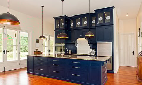 Functional pantry with custom shelving, designed for optimal storage by Barrett Joinery.