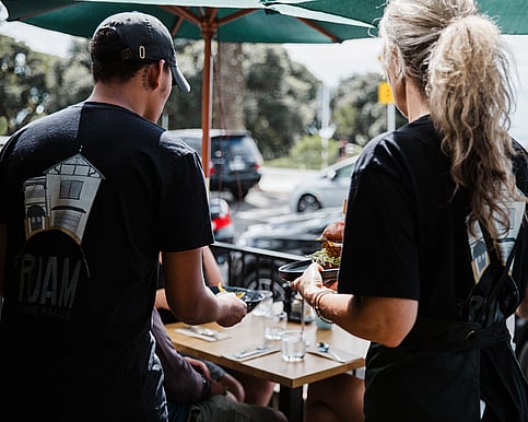 Image of branded ROAM Marine Parade cafe t shirts. Napier, Hawkes Bay. New Zealand.