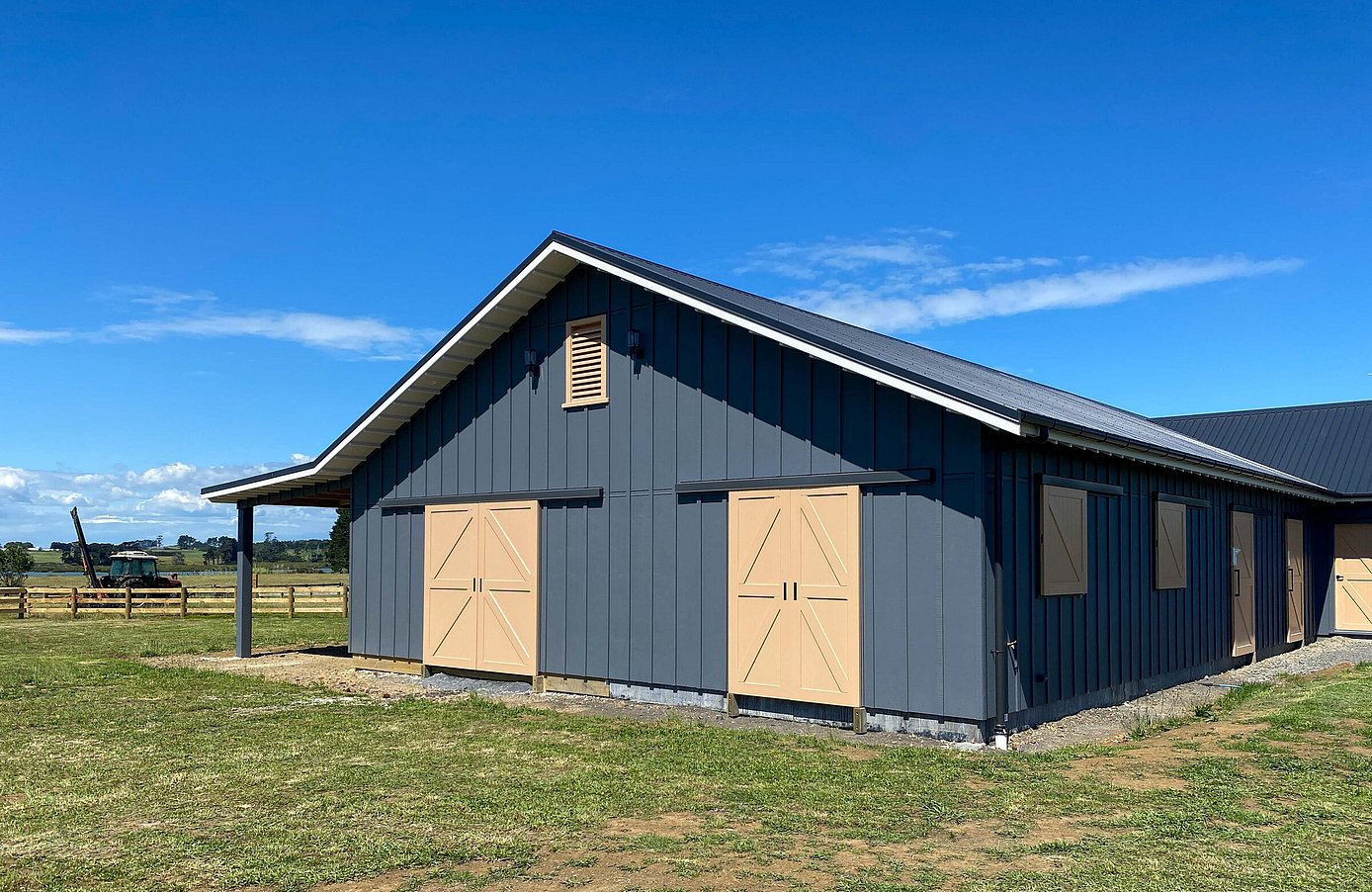 View of barn from western end showing two sliding barn door entries